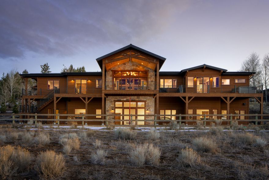 Experience the perfect blend of luxury, craftsmanship, and nature in this stunning Tumalo retreat. This 3,967 sq ft home with 11 car garage was built in 2023. It has breathtaking views of the Deschutes River and stunning canyon beauty. The exclusive private community has vast scenic walking trails along the river to Awbrey Falls, floating sections, community parks/ gazebos, and secluded pockets to fish. A rare find, the daylight basement consists of a 9 car garage, sound isolated movie theater & storage rooms. This oversized downstairs garage is ideal for RVs, boats, shop or customize the space with additional bedrooms, bathrooms, or whatever suits your needs. The main level of the house is equally as breathtaking with a zero entry into this 4-bedroom 3.5 bath includes a 2-car garage, office with private entrance, full chef's kitchen with Thermador appliances, Sonos surround sound, Butlers hidden pantry, quartzite & granite countertops. A true sanctuary only 10 minutes away from Bend.