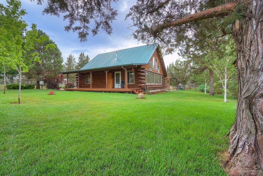 Enjoy living at the edge of BLM with amazing Cascade Views. Well kept log home has rustic appeal with modern amenities. Main level master, huge loft area overlooking great room & out to the Mountains. Open kitchen w/bar seating & large dining area - local pine accents. Charming covered front porch out front, paver patio w/ pergola in the back. Dbl by garage with attached workshop, storage building, loafing sheds & fenced for livestock. Bring your horse & ride out the back gate for miles on BLM. Call Today!
