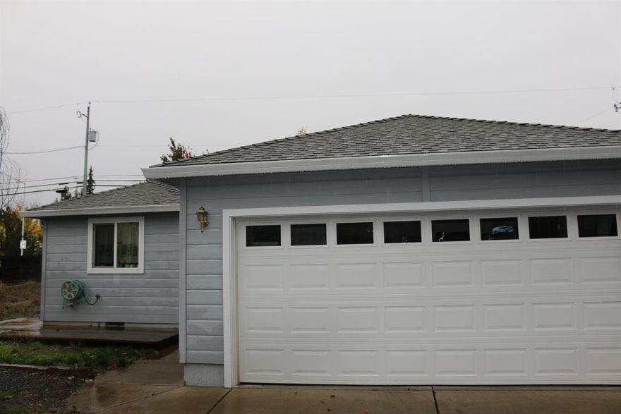 3 bedroom/2 bath home 1300 sq. ft. home in White City! This home has vaulted ceilings in living room, roomy kitchen with gas stove, master bedroom with walk-in closet and spacious bathroom. Finished attached two car garage. Fenced back yard has fountain with covered patio and Hot Tub. Home has non-buildable vacant lots on both side of the home for additional room for kids to play. Buyer to do own due diligence regarding all aspects of property.