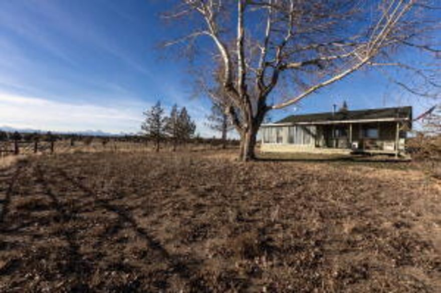 Beautiful 100 Acre parcel in two Tax lots(both Legal Lots of Record), including 55 acres of Irrigation water. Fantastic cascade mountain views and adjoins thousands of acres of BLM. Nice rock outcroppings and multiple building sites. Property is fenced and cross fenced set up for Cows or Horses. Brand new concrete bridge across irrigation canal to accommodate heavy duty farm equipment. Includes pond with pivot line for irrigation and a private well/cistern. 48x40 Rustic barn with tons of character. Nice 2bd, 1ba 1080 Sqft house. Lots of possibilities and is a must see. Come build your dream home with all the views and privacy one could want.