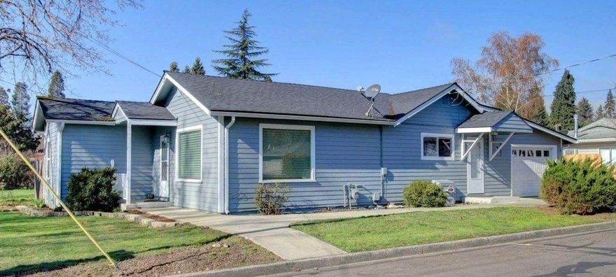 This recently remodeled home located in the desirable school District 7, close to the downtown Historical area, shopping and parks is a must see! It has 3 bedrooms and 1 bath (3rd bedroom is located through the garage and has its own private entrance). Recently painted inside and out. Home features crown molding on living room doorways along with new flooring, fence, light fixtures, window dressings and stainless steel appliances. Heat pump and water heater are just over a year old. Garage has a nice work bench, sprinklers are on a timer, and the private back covered patio is perfect for a BBQ or hot tub. Spacious RV parking along with the attached garage give ample parking and storage.Motivated seller, bring your offer. View today... at this price it will go fast!!! Listing agent is related to seller. All information deemed accurate but not guaranteed and subject to change at any time.