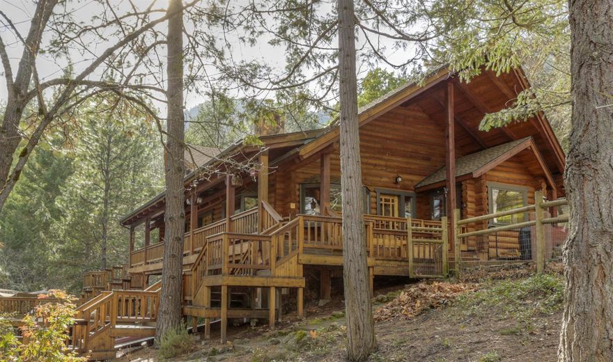 A rare opportunity to own this amazing estate! Splendid log home located in a private wooded setting overlooking Lithia Park. Warmth, style, spaciousness & quality throughout! Perfect for outdoor entertaining with large wrap-a-round decks & stone patios with a fire-pit all on a quiet, secluded .63 acre lot. In the gourmet kitchen you'll find granite countertops, Electrolux appliances, custom cabinetry, a large island cook area, dual dishwasher & a 5 burner cooktop. The main level master suite includes built-in book cases, a pellet stove & a large bay window with bench seating and views! Then relax in the master bath Jacuzzi tub and walk-in tile surround shower. The amenities list is amazing. This is a must see!