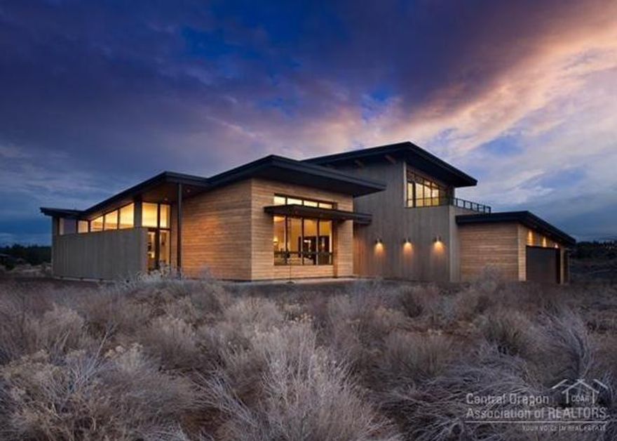 Neil Kelly Co. & BLRB Architects have collaborated to design & build a spectacular LEED Certified home within gated Heath Community of Tetherow. You will find a blend of Mid-Century Modern & NW Rustic Flare that makes this home one you simply won't want to miss. From the staggered-stud wall construction to the 10-piece Miele kitchen appliance package, no details were left untouched. The design plan boasts a spacious great room, a tranquil sitting room w/built-in desk & a roof top deck w/full Mtn. views.