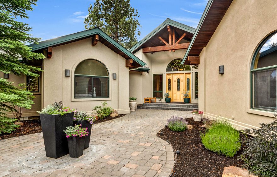 Seclusion awaits in this gorgeous single-level home built by Steve Berg, Sound Construction. First time listed, the home is a masterpiece of style & elegance with living spaces of unparalleled beauty. Great room features vaulted tongue-and-groove wood ceilings, gas fireplace, built-in cabinets, wet bar, hardwood floors & metal-clad wood windows. Abundant cabinets in the kitchen, large island, premium SS appliances & walk-in pantry accommodate the most particular chef. Owner's suite includes sitting area & gas FP, oasis bathroom with two vanities, heated floors, steam shower & two walk-in closets. In addition to two guest rooms, home offers spa solarium accessible from owner's suite or hall, office with two built-in desks & ample storage, large art studio & laundry room. Two-bay, four-car garage features heated floors, overhead electric heater in workshop bay, tremendous built-in cabinets & separate storage room. Trees & shrubs transition to native vegetation on this 2.38-acre lot.