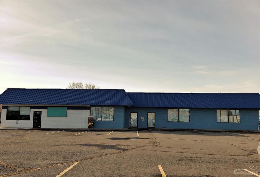 Great commercial building in a great location and priced to sell! You can't beat the high visibility location on Hwy 97. This building has two units. The large suite, #538, has an open workable floor plan with multiple entrances, bright open windows, 4 private offices, 2 open offices, break room, 2 private restrooms and multiple storage rooms. The small suite, #534, has an open floor plan, back office, private restroom and is versatile in that it can be used as a store, office or is plumbed for restaurant use. The package includes a large, paved parking lot with a lighted reader board. Both units are currently available for rent.