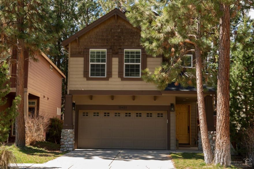 Stunning home in desirable SW Bend, across from Hollygrape Park. Upgraded from top to bottom, this home has Acacia Hardwood floors in Kitchen, dining & family room along w/tile in Entry & 8' Alder wood front door. The Kitchen has cherry cabinets, SS appliances, Leathered Granite countertops, custom island, tile backsplash, farmhouse sink, and pot filler. River rock gas fireplace w/blower, wood wrapped windows & french doors to the back deck. Upstairs master bedroom is large & roomy w/wood plank vaulted ceilings & barn doors to hide the wall mounted TV. Master bathroom has Granite countertops, tile floors, double sinks & walk-in closet. Upstairs laundry room along with 3 additional bedrooms, two with vaulted ceilings. Other upgrades include like new carpet, tile bathroom floors & bath hardware, 5' trim & new light fixtures throughout. Double car garage w/workspace, built-in cabinets, fenced backyard w/gas BBQ & A/C.