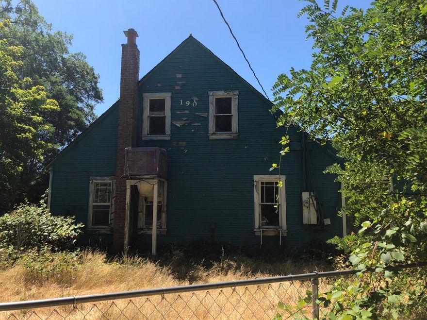 5 acres with well, septic, power and 5 legal non conforming residences. These buildings are homesite place holders and have development permits. This is a great opportunity for an investment / rental property! Buyers to do due diligence on all information regarding the residences. Property must be seen with an agent.