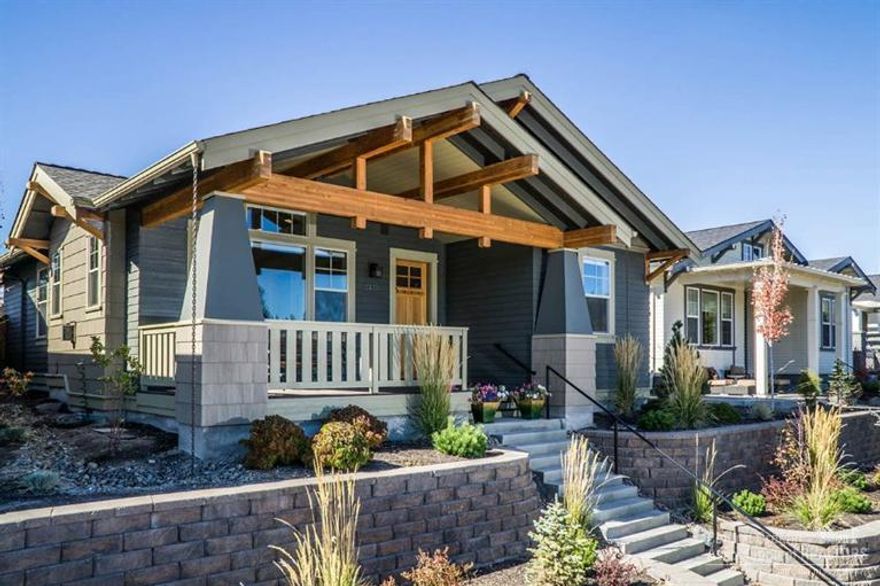 You must see this wonderful NW Crossing Craftsman Single-level home. Great Room w/Hardwoods, Built-ins, Fireplace & Vaults. Wonderfully appointed Kitchen with Skylights, Island and Eating Bar. Master Suite w/Walk-in Closet separated from Guest Bedrooms & Bath for privacy. Enjoy the large front porch elevated above street & covered back Patio in one of the largest fenced, landscaped yards in the neighborhood. Spacious 2-car garage w/alley entrance. Close to shopping, parks, trails and minutes to downtown.