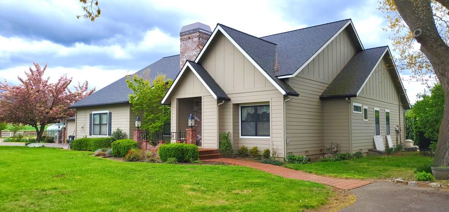 Country Elegance close to Jacksonville! Situated on over 18 acres on the outskirts of Jacksonville and Medford, Oregon sits this boutique vineyard property. Located well off the road, the main home features 2 Bedroom + additional detached bed, and 2.5 baths and has been recently updated with high end features. The formal office has fireplace, floor to ceiling built-in bookshelves, and views of the vineyard. The main living area has great room with fireplace, bonus TV room, chef's dream kitchen with large island, hardwood flooring. Master suite features large area with walk-in closet, and a very luxury en-suite! The detached 1 bedroom suite is an added bonus for extended family, guests or in-law area. Outdoor living includes covered concrete porch, in-ground pool, fire pit area, seasonal pond and greenhouse. Lots of mature landscaping, tons of parking for parties or events, and amazing vineyard views in all directions. 12 Acres of pasture and irrigation makes this a must see property!