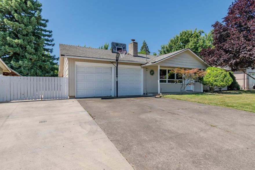 You'll fall in love with this great home tucked away in a friendly Central Point neighborhood close to Crater High. Step inside and you'll immediately notice how well-loved this home has been. it offers 3beds/2baths and the large primary bedroom has been extended and added gorgeous vaulted ceilings that make you feel like you're in a cozy retreat with a primary bathroom and walk in closet that has been redone and ready for the morning rush. Outside, there is plenty of RV parking and the backyard offers a massive outdoor space where countless memories can be made. The large covered patio can be great for grilling and entertaining with plenty of yard for fun activities. Whether you're hosting the neighborhood barbecue or just want a quiet place to unwind after work, this outdoor space has you covered in every season. This isn't just a house - it's a place where you can truly settle in and call home.