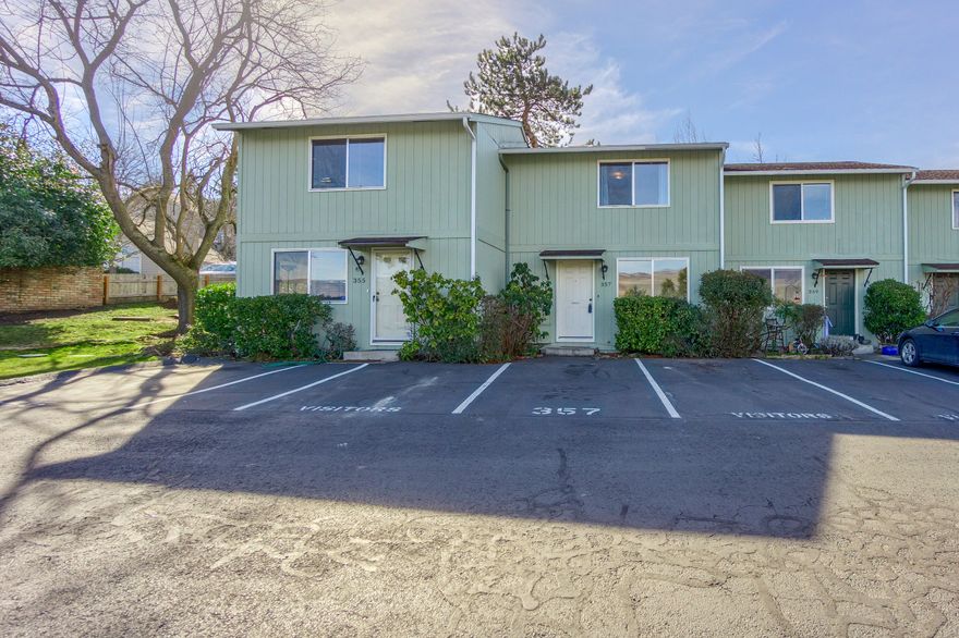 Affordable townhome in Ashland with lots to offer.  Views of Grizzly Peak from the front and nice light from the afternoon sun in the back.  Nice size backyard with new deck.  Kitchen features solid surface counters and eating area.  Newer stainless steel fridge and dishwasher.  Fridge and Washer/Dryer included.  Downstairs half bath features newer vanity, sink, toilet, and light fixture.  Great location, close to downtown Ashland and all it has to offer.  HOA fee includes water, sewer, landscaping/maintenance for common areas, which includes front area outside front door, and parking lot maintenance.
