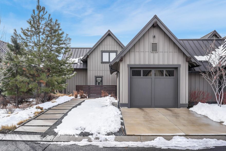 Welcoming lovely Tetherow Cabin, lightly lived in as a second home. Great room features warm wood accents and built ins flanking the gas fireplace. The highly efficient kitchen is equipped with a generous pantry cabinet, hood vent with warming lights, and Kitchen Aid appliances, including a 6-burner range. Luxurious finishes include a granite clad island with bar seating for 5 on generous sized stools. Primary en suite and laundry area are on main level for easy living. Downstairs also features a built-in locker/bench in entry way and powder bath. With great separation from the main bedroom, the second bedroom and bath are upstairs. Also upstairs, a large bonus room offers many possibilities for the way you live. Office? Game room? Gym? Movie room? The mechanicals for home are in a finished upstairs space for easy maintenance. Single car garage (21 feet deep) with extra space for storing or working on toys for the Bend
lifestyle.