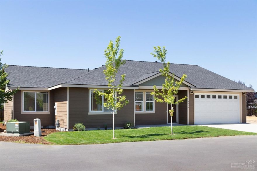 Stunning new home in quiet NE Redmond. Single level home with beautiful Pergo floors throughout main living area that perfectly frames the stone fireplace in the great room. Vaulted ceilings, gorgeous open kitchen with granite counters, large island, and beautiful SS appliances. Oversized master bedroom has raised coffered ceiling and large windows for lots light. Granite in all bathroom vanities with custom tile work. Front Den could potentially work as 4th bedroom.