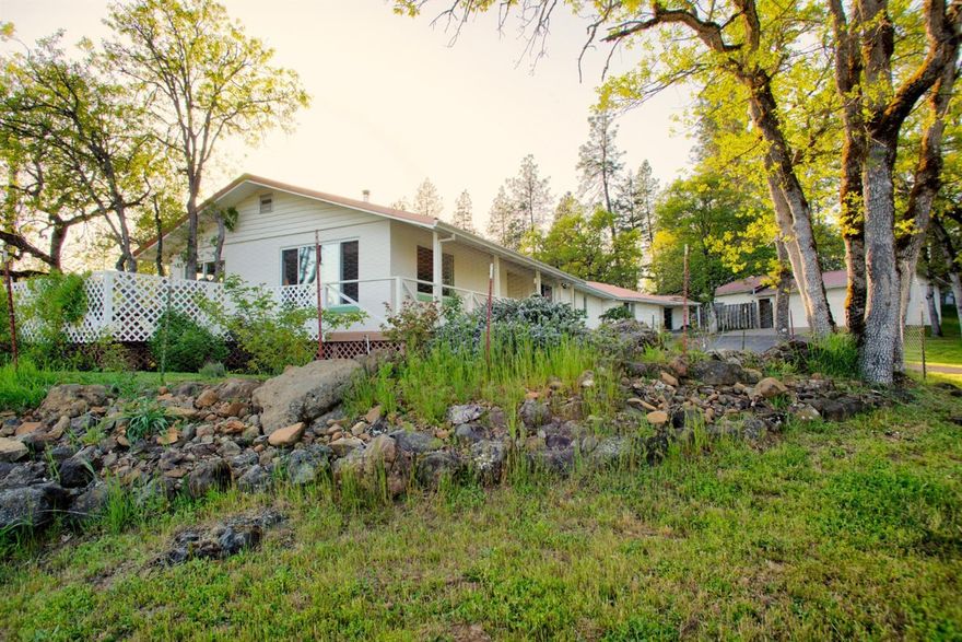 Now a true 3 bedroom! Beautiful Shady Cove Country Home on over an acre with Long Range Views! Home features a large master suite with a fireplace. Freshly painted inside and out.This home has a wrap around deck. One of the decks is also over a previous built in pool if your inclined to revamp. A Separate Dwelling with bathroom and shower and small kitchenette for your quests or use a a project room (Is NOT a legal 2 family setup). A 2 car detached garage, finished and well insulated and paved circular driveway. Plus a Shop with a private entrance. Great Neighborhood watch. Make an appointment today to view. Close to recreational areas.