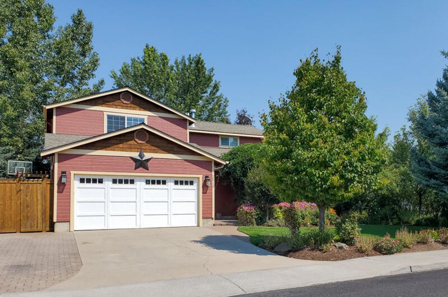 Welcome Home! To this Immaculate one-of-a-kind home located on a beautifully landscaped Corner lot in NE Bend. This beautifully updated home is move-in ready. The home has a beautiful back yard that has something for everyone including Hot Tub. The kitchen has Stainless Steel appliances and quartz counter tops with a breakfast bar. The main living area is carpeted and a gas fireplace. On the main level you will also find the master bedroom and bath which boast a soaking tub. Upstairs you will be greeted by the open loft area with a gas fireplace and 3 bedrooms with a full bath. The backyard is made for entertaining and gorgeously landscape with sprinkler system in both the back yard and front yard. The AC was new in 2016, a 50-year roof in 2017, Exterior paint in 2018, New hot water heater in 2019, New carpet in 2020. This home is a must see. Schedule your showing now.