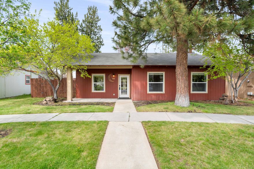 Located in the coveted SE section of Bend on a beautifully tree lined street, this well-maintained home offers exceptional value and a floor plan that lives larger than its 1,200 square feet. The open-concept main living area features a corner gas fireplace and roomy kitchen with center island, granite countertops, stone backsplash and a spacious pantry. Just off the kitchen, a fully fenced backyard sanctuary with mature trees, just the right amount of lawn and a large deck is perfect for entertaining or quiet moments of relaxation. The primary suite includes an attached bathroom and walk-in closet for ample storage. Just minutes from neighborhood favorite Foxborough Park, Silver Rail Elementary, the new Caldera High and expansive 37-acre Alpenglow Park with bouldering, lawns, event pavilion and off-leash area for dogs.