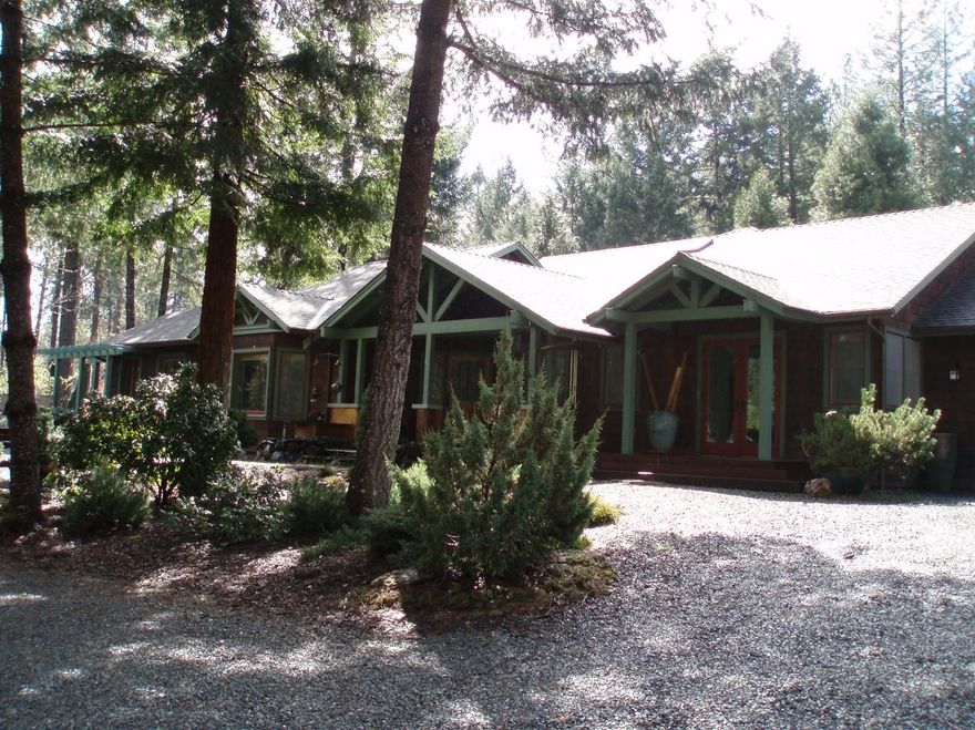 Fantastic, high quality home with eye catching finish work at every turn. Light,bright Craftsman style which will thoroughly impress your senses from your first step in the door to the exterior decks and garden landscaping. Gorgeous bedroom suite with glass shower, jetted soaking tub and granite walls.Separate, additional two car garage with finished home office or studio space for the artist, craftsman or extra company. This home is truly spectacular and lends itself well to a home office. Access to Griffin Park and the Famous Rogue River just a short walk down the street for your rafting and fishing enjoyment!