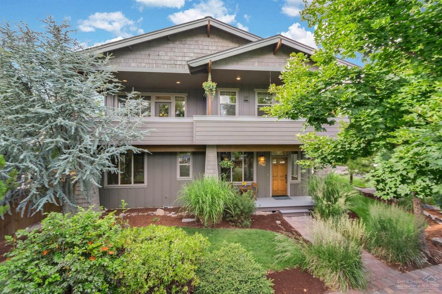 This stunning home on a corner lot is surrounded by beautiful trees and located in the desirable NW part of Bend. It is a stones throw from the Deschutes River and additionally just as close to the popular River Trail that accesses downtown Bend and the remarkable Archie Briggs Canyon. It is backed to scenic acreage that offers privacy and tranquility. The upper level offers a spacious great room with amazing views, vaulted ceiling, lots of windows, floor to ceiling stone fireplace, powder bath, kitchen with granite countertops, stainless steel appliances, solid wood floors, big deck for entertaining, W/D hookup, master suite with jetted tub and heated tile floors. The lower level is setup as a guest suite with a kitchen, living space, two bedrooms, Jack and Jill bathroom, laundry room and has a separate entrance that opens to the private backyard.