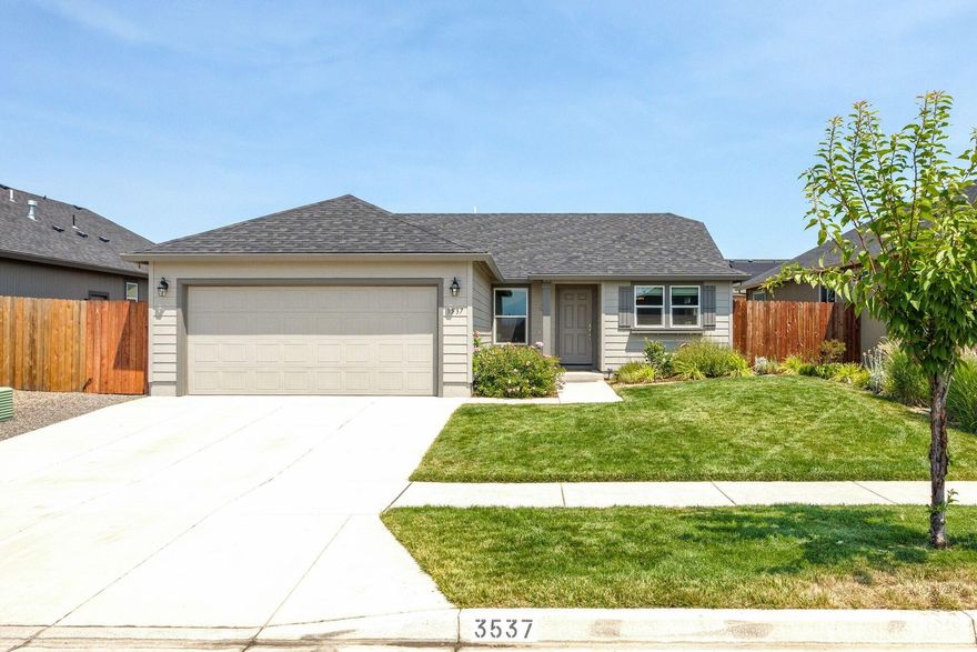 Better than new! Yes. this wonderful single level 2019 built East Medford home is just the ticket!  
Meticulously maintained, with beautiful territorial mountain view from the large kitchen window, this home features upgrades not typically found in brand new construction. Such custom Window Blinds/Shades, Newer stainless Kitchen Fridge and stove/oven, some upgraded fixtures and toilets, add. garage shelving and added insulation above garage.  There's also a nice covered patio area to enjoy the outdoors any time of year.  You'll love relaxing under it on a quiet summer's evening, or possibly barbecuing with family and friends. With an inviting yard/ landscaping, you have just enough green to feel tranquil without a lot of yard maintenance.  There's even a dog run for your 4 legged family members!  You'll find the location is a big plus also~ nestled in an area of newer homes it is not only visually appealing, it's super convenient for shopping, healthcare and schools.