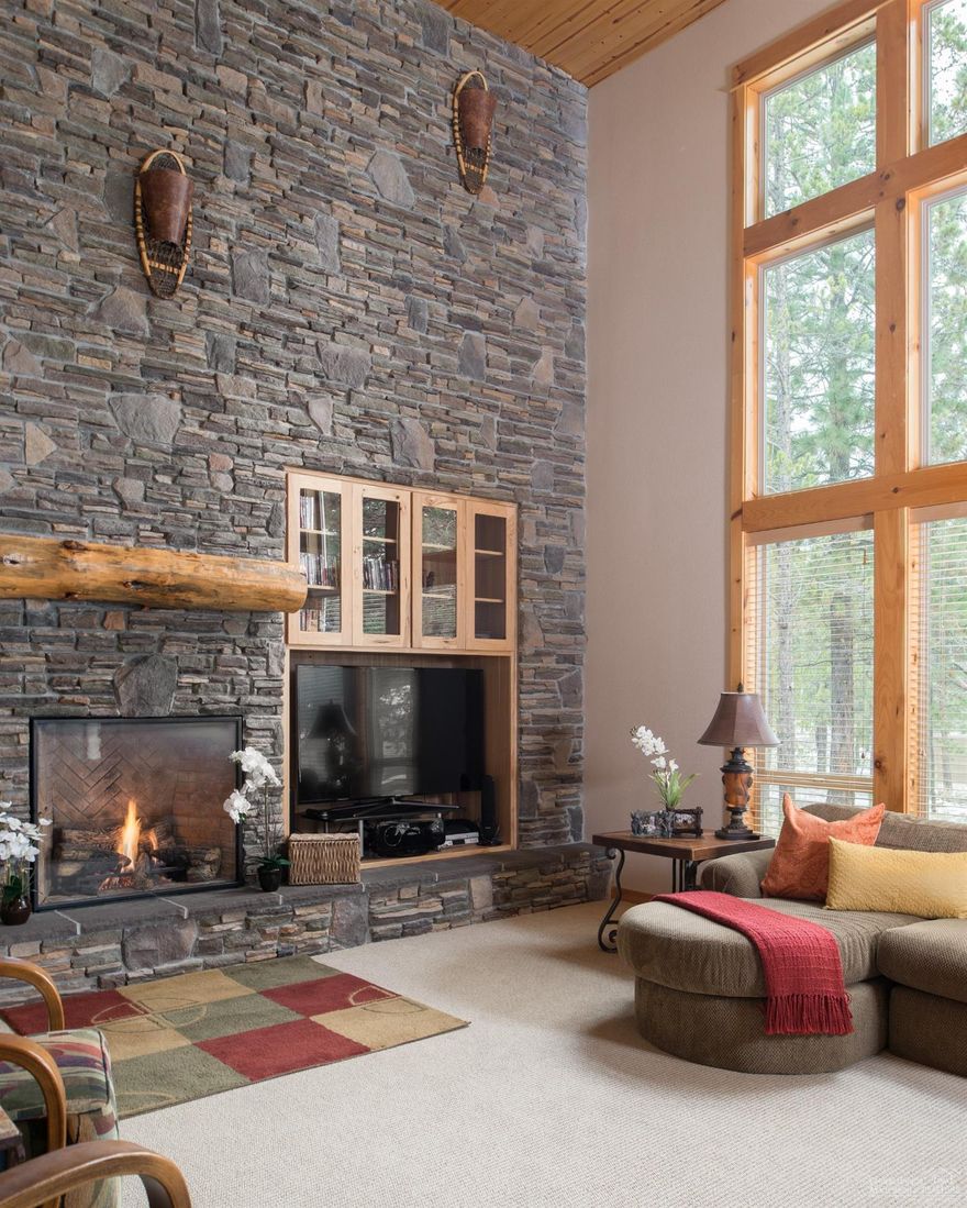 Time To Live Large- and this is it! Offering 7 Suites plus a bonus room w/ pool table. There are 3 bedroom suites downstairs & 4 up. Great room features vaulted ceilings w/ open beams, a gas fireplace w/ pine mantle & rock surround creating a beautiful focal point. Gourmet kitchen offers high end KitchenAid & Bosch stainless steel appliances; 5 burner gas stove top, double ovens & granite counter tops. Quiet North end, close to the River. Hot tub, 2 A/C units, 2-74 gal water heaters, triple car. SHARC Paid!