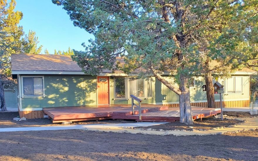 Welcome to this beautifully updated home nestled on 1+ acre in Tumalo Whispering Pines subdivision, just five minutes outside of Bend.  This property offers the perfect blend of comfort, affordability, and independence. This home has undergone thoughtful renovations to enhance both style and functionality, making it a standout option for modern rural living.
 
Key interior features include beautifully updated kitchen with new cabinets, sleek countertops, new appliances, island, and durable and stylish new laminate flooring.

Exterior features include bonus room on back of garage, xeriscape front yard with new crushed rocked paths and mulch for low-maintenance curb appeal. RV parking/hookups — ready for your visitors. Two versatile storage sheds for tools, hobbies, wood or gear. Concrete basketball court for recreation and fun. Fenced garden area includes raised planter boxes.

This property is move-in ready and packed with features that make it stand out.