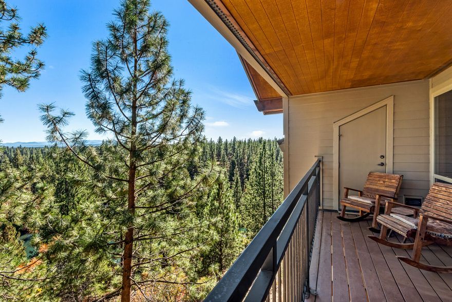 Sit back and enjoy panoramic views from this top-floor condo at Inn of the 7th Mountain. An open living area with wall-to-wall windows fills the space with natural light and frames sweeping forest and ridgeline scenery. Step outside onto the oversized 128 sq ft deck — the perfect spot for morning coffee or relaxing after a day of Central Oregon adventure. The spacious primary suite is complemented by a murphy bed for additional guests, while the floor plan provides comfort and functionality year-round. This unit also includes a larger storage area than many others, plus AC for convenience. Furnishings are included at no stated value, with brand new mattresses. Inn of the 7th offers a wide range of amenities including pools, hot tubs, fitness center, pickleball, tennis, seasonal ice rink, sport courts, trails, and on-site dining. HOA dues cover most utilities, internet, cable, exterior maintenance, landscaping, and snow removal. Pet friendly with low property taxes!