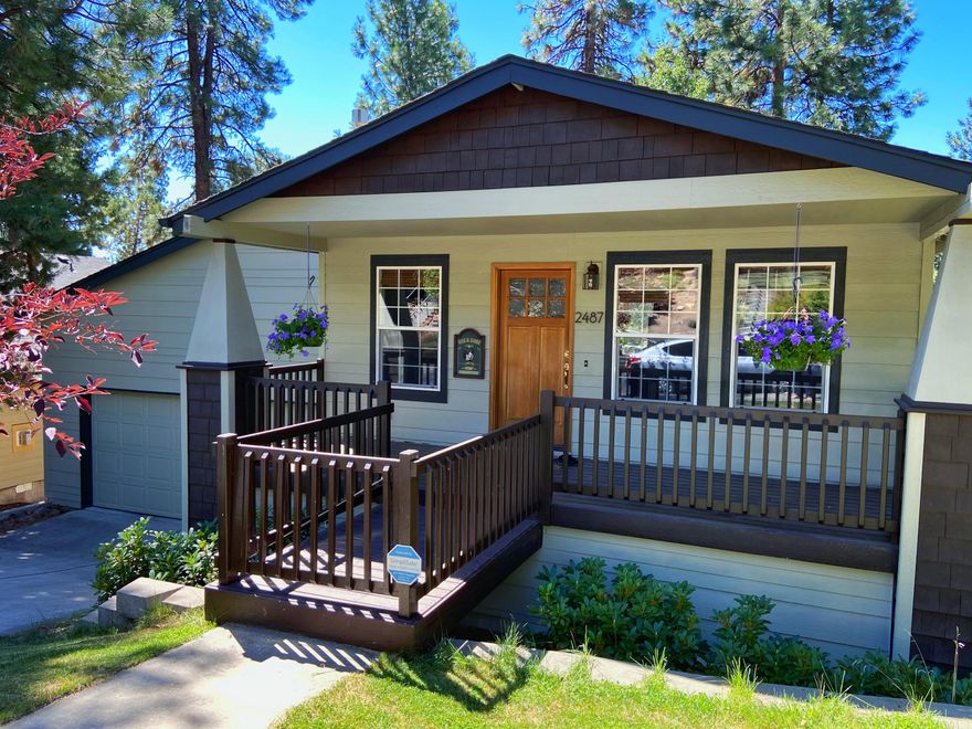 Super Cute westside craftsman home situated among pacific northwest pines, this 2bd/2.5 bath home has a location that will be the envy of many.  The large open living space upstairs flows into a recently touched up kitchen, complete with new quartzite countertops, pendant lighting and all new Samsung stainless kitchen appliances. Both bedrooms downstairs have their own walk-in closets allowing for the perfect setting for Bend living and entertaining.  Spacious decks in front and back bring you comfortably outside to enjoy the wonderful Bend weather. In the back you'll also find a recently added flagstone patio just outside the master bedroom, complete with a water feature to help you relax in the shade.  A custom-built chicken coop with egg laying hens also call the backyard home.  Private driveway and oversized garage with workbench, shelves and extra storage is perfect for all your toys! Located down the street from Newport Market, NW Crossing, bike trails and downtown.