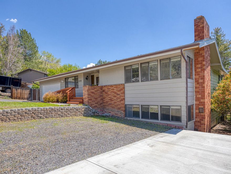 This North facing home is situated at the top of Beckton Ave with views of the Basin. 
As you enter into this 2,574 sq ft two level home you will find 5 bedrooms, 3 bathrooms, space for an office, and plenty of room for entertaining or housing guests. There is a large room tucked downstairs perfect for a game hall, media room, or second living room. The kitchen is equipped with stainless steel appliances, a breakfast bar and a formal dining room ideal for your holiday traditions. A sliding glass door exits onto a spacious deck overlooking a second patio and the large backyard. There is ample room for parking when hosting your evening BBQ's, a pad for your RV, or space for your hobbyist with too many toys.
We have an appraisal which can be transferred to any lender and a pest and dry rot inspection on file.