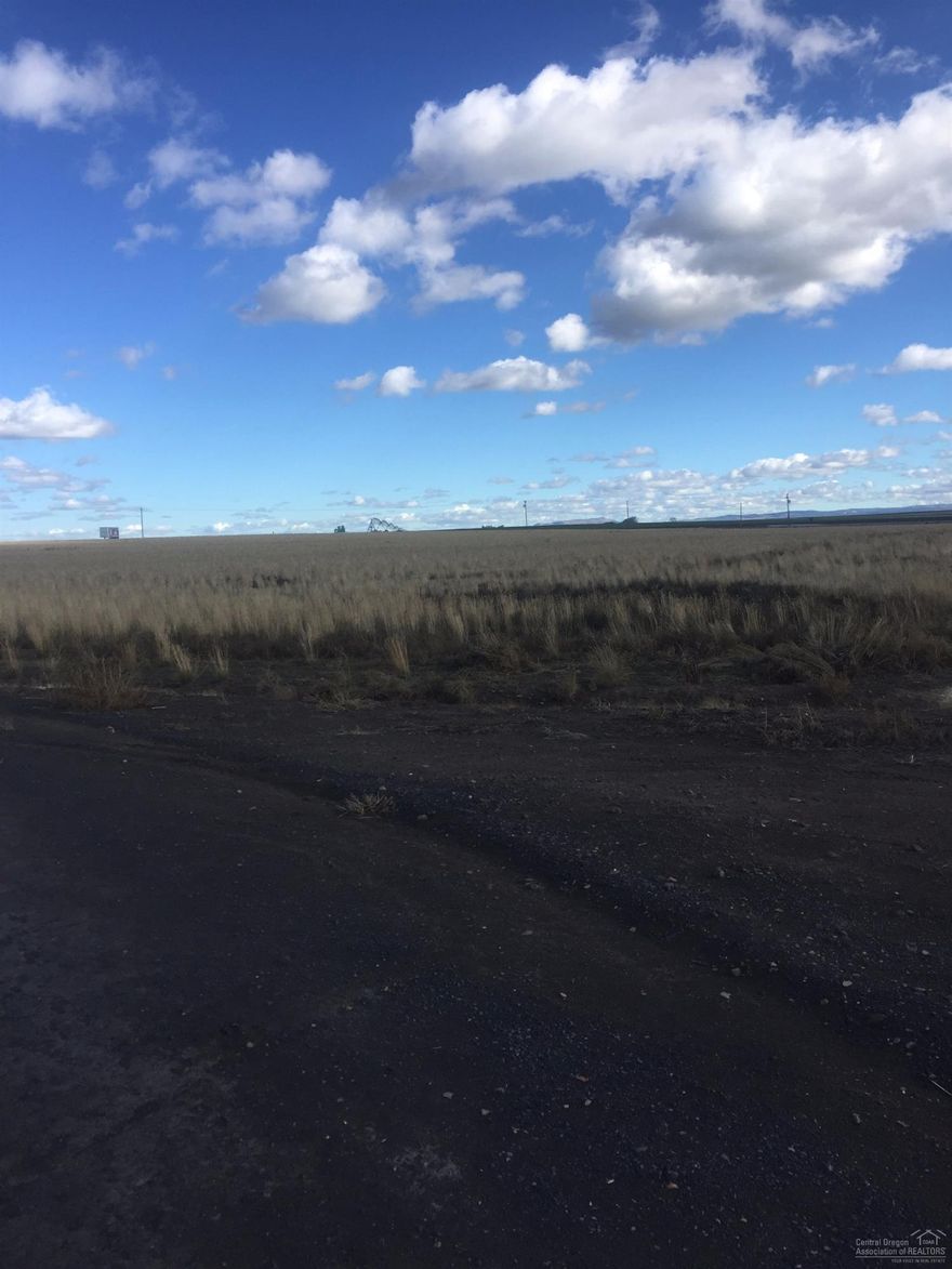 Plenty of room to build your dream home with space left over. Less than 5 miles from town. Water Rights from Deschutes Valley Water District. Great views of the mountains all around.