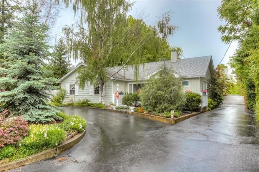 Solidly built 50's ranch on a gorgeous TID irrigated .36 acre lot. In addition to the single level main house, there is a 750 sq. ft. detached guest house and a two car detached garage. The main house features Oak and Hickory flooring, custom built-ins, a formal living room with large picture windows and an oversized family room with direct access to the patio. The kitchen is quite spacious, has tremendous built-ins, a large dining room and newer appliances. The detached guest house has a large living space and kitchenette, full bathroom and bedroom. Lush and mature landscaping includes the most gorgeous Sycamore Tree you have ever seen. Paved and gated driveway, great privacy and a very close-in location. Newer HVAC system, roof, windows and so much more!