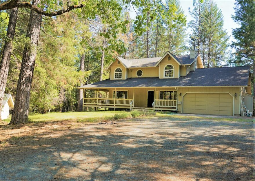 Highly Desirable Country Neighborhood lined w/high-end homes sits an Opportunity for someone willing to put in some LOVE for cosmetics & updates to make this home shine again.  Priced Accordingly! This Fenced, Gated & Level 2.6 acres features a metal RV Shelter, Storage shed w/Power, Chicken Coop & kids play area. Spacious home w/1728 sf (per county) features a Covered Wraparound Deck w/Lovely Countryside Views. The main floor has Primary or In-law Suite w/a vinyl sliding door to access porch, walk-in closet, a private bath w/dbl vanity sinks & shower w/deep tub. The 2nd Lg Primary Bdrm upstairs has a shared Bthrm w/dble vanity sinks & walk-in marble shower.  Extra Bedroom & Bonus room are upstairs.  Open Floor Plan dwnstrs has Lrg Kitchen w/Spacious Granite counters, Xtr Cabinet Storage, Brkfst Bar, Recessed Lighting, Bay Window above the dble basin sink, Dishwshr, Glass-top stove/oven & Pantry area in Laundry Rm w/Half bath. Dining area has slider to back porch. Must See/Call Today!