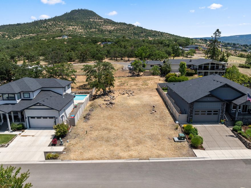 Surrounded by beautiful homes and mountain views, this gently sloped lot is able to accommodate a 4,000 sf house with a 3- car garage. Build your dream home in this upscale neighborhood above the Valley floor. Gorgeous Valley views yards from your custom built home. The Seller has home plans available and discuss at length the envisioned home that caters to your every detail and whim! Come immerse yourself in a luxury lifestyle in Panorama Heights!