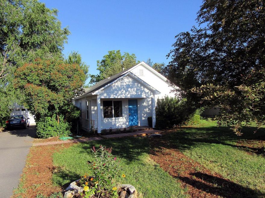 Darling 3 bedroom 1 bath circa 1930's home. . Room to easily add bath. New exterior and interior paint on home and new exterior paint on 24x30 garage. Beautiful fir wood floors, gas wall heat, new French door, some vinyl windows, new steps, attic insulation. Charming kitchen has 2 new additional cabinets with pull out drawers and new formica, electric range and refrigerator. Lovely landscaping, with fruit trees, flowers, all on .54 acre in quiet country neighborhood.