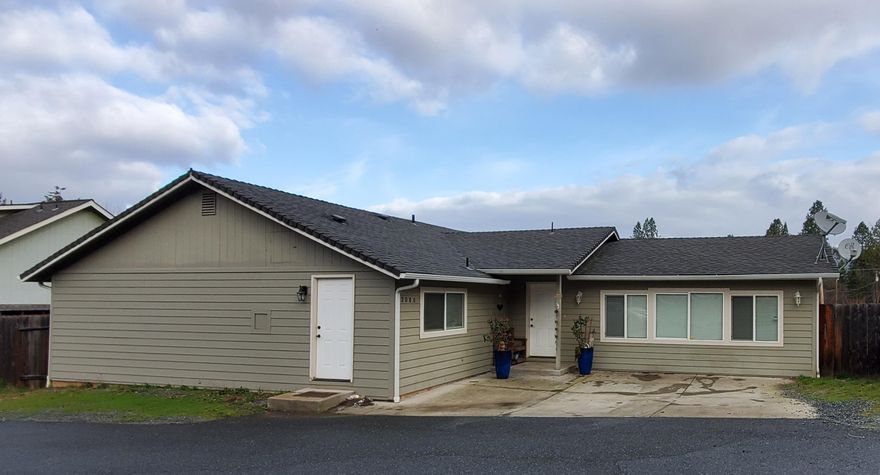 Nicely remodeled home with 2 masters along with 3rd bedroom and bath, living room and family room or play room which can be changed back into garage if preferred. Great fenced back yard, views of mountains - 2 car parking in driveway, along  with possible 3rd area if side area cleared. Nice corner lot. House as 2080 as numbers on it.