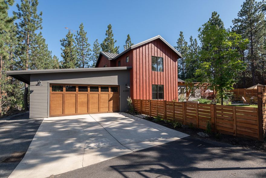 Stunning NW contemporary farmhouse in desirable 1st on the Hillsites! Situated on almost a 1/4 acre, this light and bright 2,752 sf custom home features and open floor plan, 3 bedrooms, 2.5 bathrooms, study, loft and 3 car garage. Interior features include solid surface counters, custom cabinetry, white oak flooring, steel staircase, wood burning fireplace with board form concrete, ship lap, and many other very sophisticated touches. Full size, side by side Electrolux refrigerator/freezer and Wolf range with large butler's pantry that houses two wall ovens makes this chef's kitchen a dream.  Amenities include A/C, gas forced air, outdoor hot-tub, and parameter fencing, to name a few. Fantastic west-side location, no neighborhood fees, private park-like setting, and this home currently qualifies as a short term rental! This is a must-see home and property.