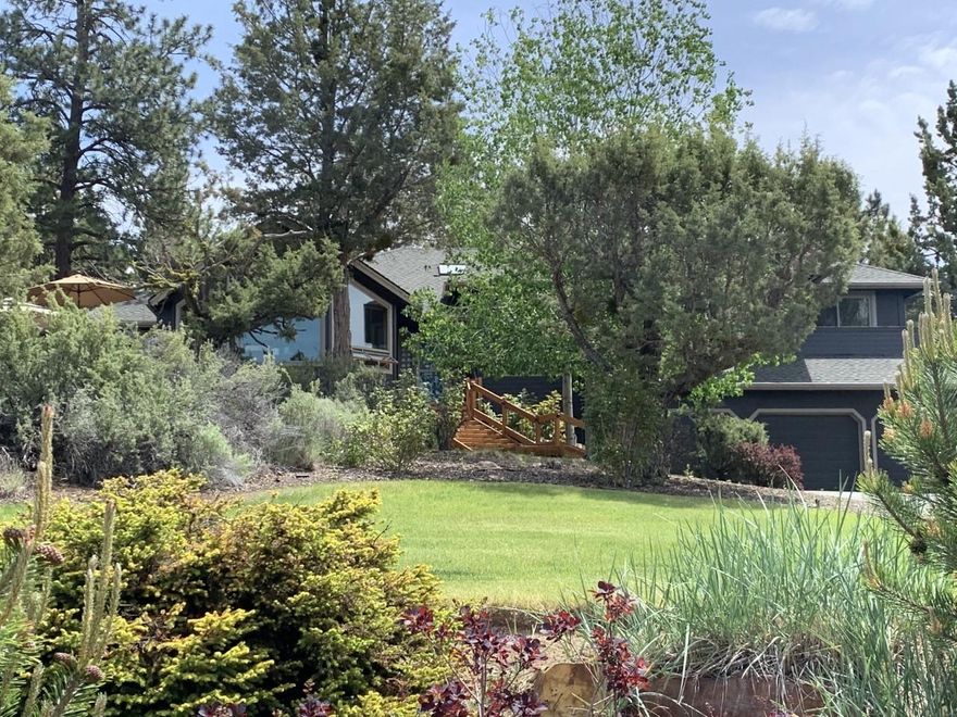 Full Cascade mountain views on oversized level lot in west side desirable Valhalla Heights. Spacious 3 bedroom, 3.5 bath home features an open floor plan, den, built-in office, and a huge bonus wing with floor to ceiling 2 sided stone fireplace, media room w/ 7 speaker surround sound system, pool table and private bath. Master suite includes a separate flex space that could be used as office, exercise room, or nursery. Paver deck offers a relaxing place to take in the views, complete with Arctic Spa hot tub. A second deck opens to the fully landscaped back yard, with lots of space for kids and pets. There is a 3 car garage and spot for RV or additional parking. Additional conveniences include central vac, security system, and integrated ceiling speakers. Close to downtown, schools, and COCC. This home is truly one of a kind and not to be missed. Call today to set up your showing.