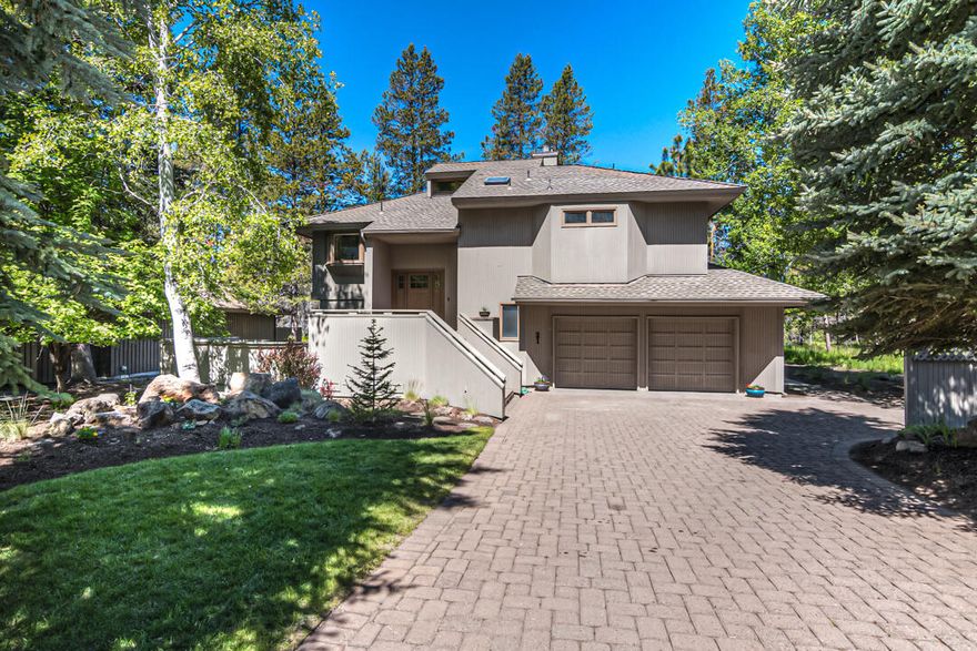 This home backs up to the true Sunriver off Golden Eagle Lane. This home has been updated inside throughout with all new appliances, wood style flooring, fresh interior paint, updated bathrooms with new sinks, toilets and tile shower. This home is a reverse living with vaulted ceilings letting the natural light shine through the wall of windows overlooking the Sunriver. New fireplace in the living room, main bedroom suit is on the main floor upstairs, 2 bedrooms and a living room downstairs. Large refinished decks giving you additional outdoor space. Large lot with landscaping and a fenced dog run area that is grandfathered in. Double car garage with a paver driveway and entrance to the front door. This is a must see property.