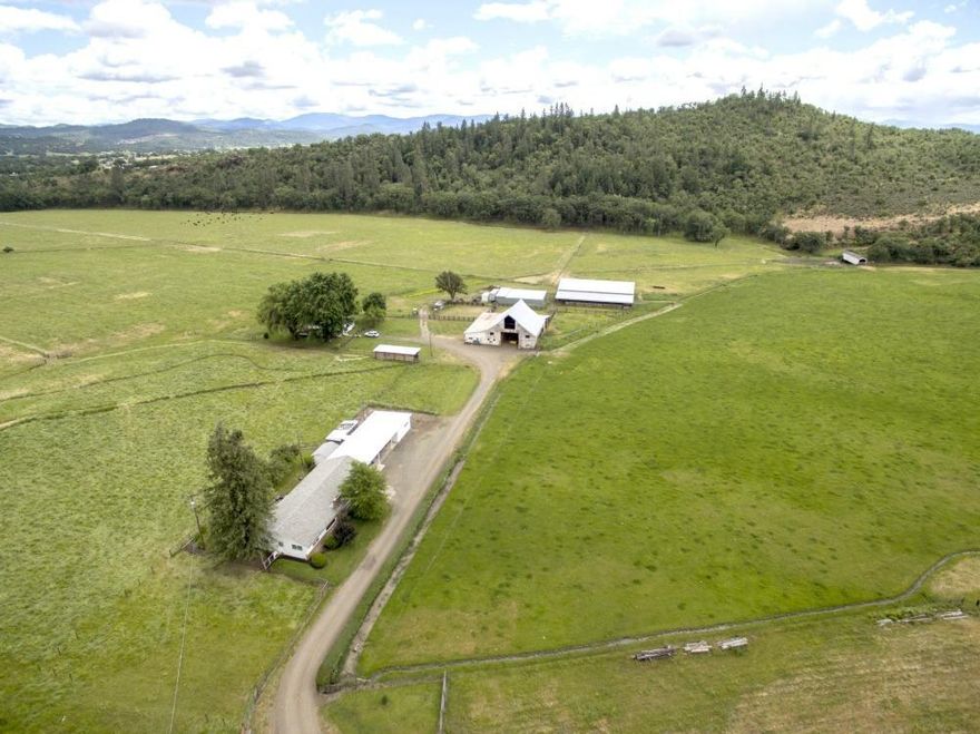 Welcome to Eagle Point! This ranch is where Eagle Point got its name. A spectacular Southern Oregon property just minutes from town with so much to offer. 294.04 acres, combining 89 irrigated acres, dry ground and hillside. The creek is year-around and beautiful! There are two homes on this ranch. The main home is a single-level 2060 sqft with 3 bdrms and 2 bathrooms. The second home is a single-level with 980 sqft and 1 bdrm, 1 bathroom. Large barn with stalls, a loafing shed and a workshop for your ranching needs. In addition a hay barn, machine shed, and a 150 x 75 covered arena with 4 stalls. Views of the ranch land and even Mt. McLoughlin from the homes and facilities. A property that has been owned by the same family for over 45 years is now avalable.