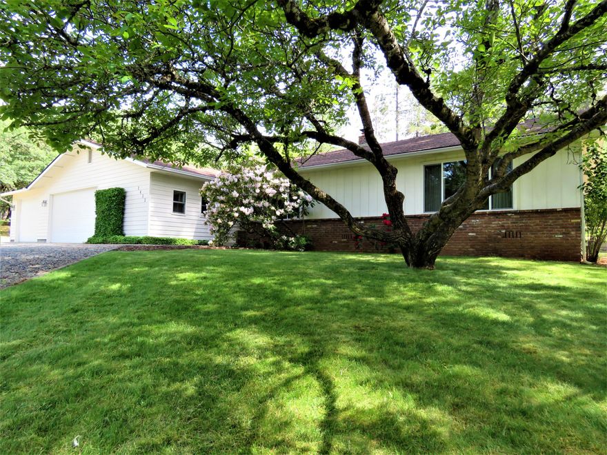 Can you hear that?  It's opportunity knocking!!  That's right~ now you have the opportunity to purchase a nice, comfortable home complete w/ 3 car garage, conveniently located just outside of town on 1.56 acres, w/ Huge shop and tons of potential to make it your own private oasis ~all at a super affordable price!  You just don't find these types of properties often... with just a bit of updating (if desired) this wonderful single level home will be just the right fit for a family or retiree.  With tons of parking there's plenty of room for all the toys ... along w/ vehicles of all shapes and sizes... possibly a pool, lg. garden and more!  Don't miss this one... it's been lovely cared for over the years and is ready for a new owner.... it could be you....but don't wait!  Call for a tour today!