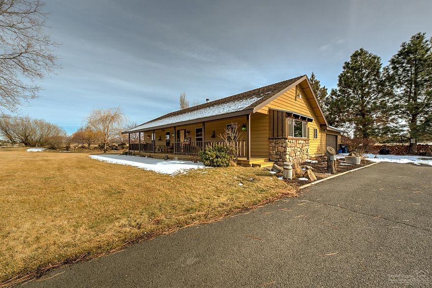Must See Park like Setting!Beautiful one level home in NW Bend.Cascade Mtn views from Kitchen,Dining area. 2 1/2 Acres w/1 acre of Irrigation.Nice setting w/perfect view of big pond from the master suite & back yard.Fenced w/pasture area.Wood accents throughout,open vaulted ceiling in living room w/wood accents. Newer wood stove.Nice floorplan w/big master suite.Spacious green landscaped yard borders canal.All new windows through out.Updated Kitchen counters,Lg covered porch. Hard to find Peacefull location