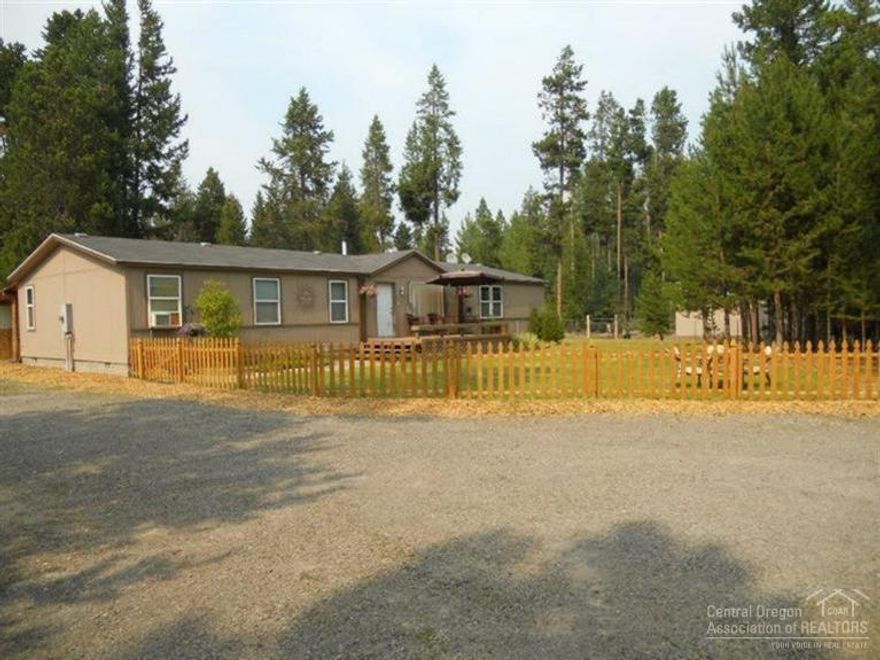 Pack your things & load the horses! Well maintained & manicured property is move in ready. Newer home w/open floor plan, entertainer's kitchen, SS appliances, spacious bedrooms w/walk in closets. Quality upgrades throughout, new counters, carpet & laminate flooring. Central wood fp & forced air heat, prvt well. Wooded property is landscaped, fenced & cross fenced w/1 stall barn & hay storage, carport & RV area. Miles of riding trails just minutes away. Pet Lodge biz available & could be taken over onsite.