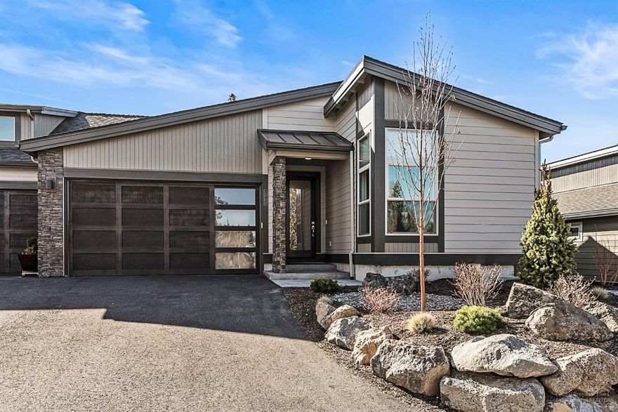 Rare opportunity to own a luxury townhome at the Pointe at River's Edge. This Kennedy model offers an open floor plan complete with a great room, cozy gas fireplace and built ins, engineered hardwood flooring, guest suite, master suite separation walk-in tile shower, dual vanity and large walk in closet, den/3rd bedroom, gourmet kitchen with breakfast island, extended garage, an upgraded aesthetics throughout. This practically brand new Pahlisch townhome has stunning golf course views from the back patio, privacy, and included are numerous Smart home features.<br>