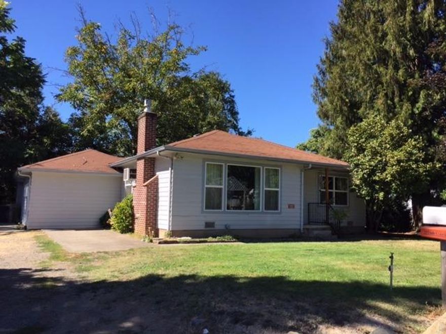 What a great starter home, retirement spot, or investment property! The former owner had the entire home set up for handicap accessible, from grab bars and ramps to a roll-in shower! The garage conversion houses a ramped laundry room and loads of storage. The windows are double pane windows, the carpet is newer, and the seller just painted the interior. The small workshop in the back yard is perfect for your handyman or lawn care storage. The yard is spacious, and the home is located close to shopping, schools and hospital. This is a sweet home for a sweet price! Vacant and being readied for you to occupy!All information is deemed reliable, yet not verified. Any person interested in this property should perform their own investigation into the uses and condition of the property.