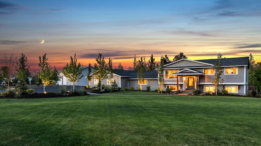 Indulge in idyllic living in this impeccably remodeled Bend home offering plenty of room for work & play! Spanning 4.5 acres, this reimagined gem offers 5 bed, 3 bath & office, RV garage & workshop.  Relax & enjoy your enchanting surroundings from elegant great-room w/ wide-plank flooring leading to adj dining area where a stylish chandelier casts an intimate glow to your evening meals. Skylights & numerous windows invite abundant natural light into the sleek kitchen w/ top-of-the-line appliances, 60' refrigerator, farm sink, automated blinds, pantry & expansive island/breakfast bar.  Enjoy the privacy of the primary suite w/ cork flooring, walk-in wardrobe & serene bath. 
Beautifully finished living spaces inc 4 addtl bedrooms, family room, office w/ access to patio & a laundry/mud room.  In addition to attached garage, the detached approx. 48 x 32 & 51x32 workshops provide an addl office, RV pkng & workshop. 
This property truly is the ideal retreat from the hustle & bustle of life