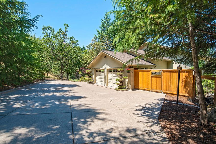 Fantastic setting with panoramic views. This well cared for 3 bedroom 2.5 bath + office with built-ins has an incredible layout with an open floor plan, natural light and chef's style kitchen with six burner range, granite counter, custom cabinetry and Birch flooring. Great room/living room adjacent to the expansive deck. Formal dining features Alder wood built in cabinet buffet and leads to a sweet balcony that would be the perfect spot to sit with your morning beverage. Oversized master bedroom is located downstairs and offers a fireplace, private deck and en-suite master bath with large jetted tub. This wooded setting feels magical with the abundant Madrone trees, and extra large terraced garden for growing your own fruits & vegetables. Cherry and plum trees, flowering shrubbery, greenhouse, deer fence, horseshoe pit + so much more. Not far from the Pacific Crest Trail if you feel like hiking, yet still close to town, this is an outstanding property.