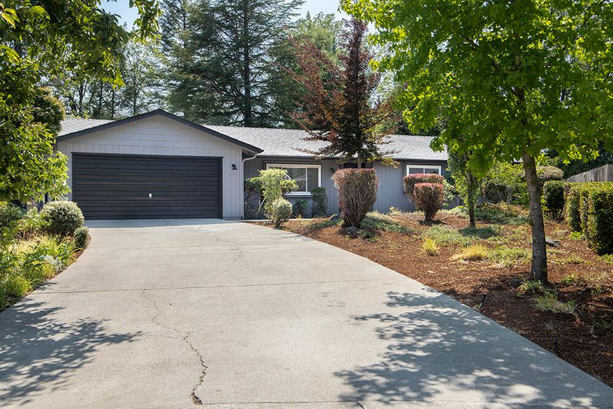 This is the perfect property for a 1st time home buyer, your grandma, and everyone in between! This single level home is full of recent updates including: a new roof, recessed lighting, flooring, recent repainting of both the interior and exterior, and updated bathrooms! The quiet and very safe neighborhood on a dead end street gives this home a wonderful setting. This 3 bedroom, 2 bath home features 1560 square feet on 0.31 acres! It is backed by the irrigation canal and a paved walking path perfect for enjoying the beautiful Oregon weather. This property is just minutes from shopping, Fruitdale Elementary School, Morrison Park, and the Rogue River! There many fruit trees including: apple, pear, plum, and a rare persimmon tree! The private backyard is waiting for your finishing touches! Call for your tour today! Seller is a licensed real estate broker in the State of Oregon.