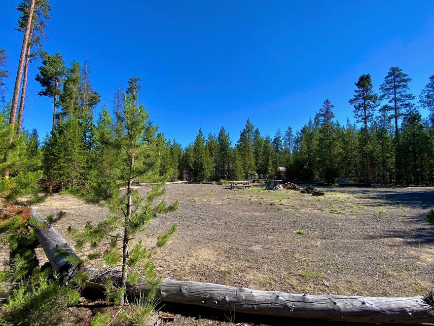 Looking for the perfect year round recreational base camp? Easily accessible off the grid living or the perfect spot for weekend getaways. Just 6 min off Hwy 97 & downtown La Pine. Lot is a little over an acre of treed privacy and is perfectly groomed & level for a getaway camp spot. Backs to BLM & is in the heart of Central Oregon recreation. Have your own spot minutes to the Little Deschutes, close to the mountains and all the other outdoor activities that Central Oregon has to offer.