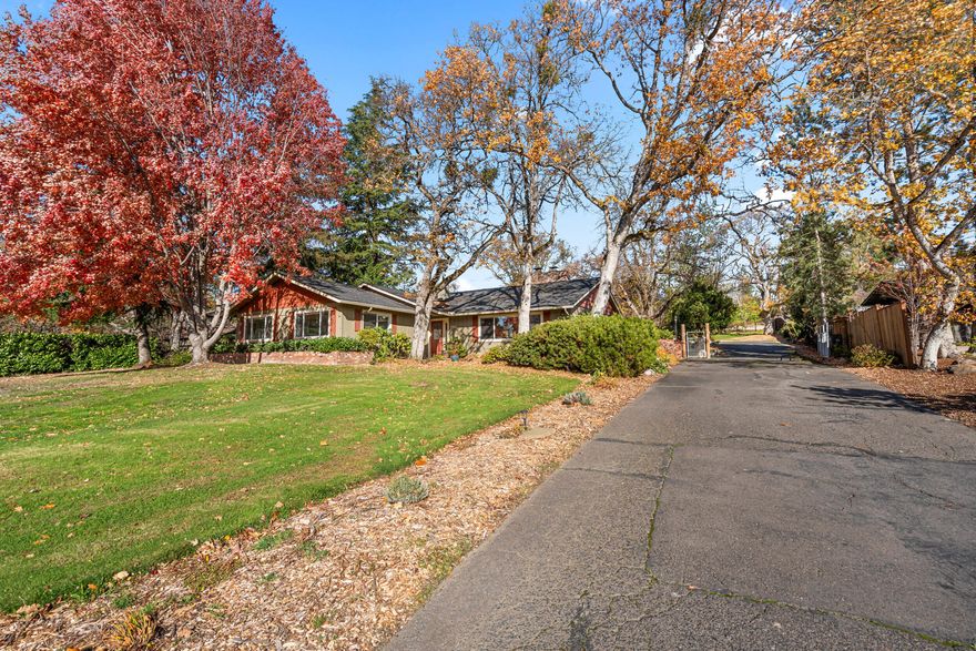 Welcome to your dream home nestled in one of the most highly sought-after areas! This expansive property boasts a generous lot, providing plenty of outdoor space for gardening, entertaining, or simply enjoying nature under the shade of mature trees. Step inside to discover a bright and airy environment, highlighted by 2 living spaces, a very large primary bedroom, 3 more bedrooms, plus an office with built ins, 2 full bathrooms and one half bath, all offering a peaceful retreat at the end of the day. Enjoy the convenience of being just moments away from Asante Rogue Regional Medical Center, top-rated schools, parks, and a variety of shopping and dining options. Whether you're looking for a quiet evening at home or a vibrant community atmosphere, this location has it all. Don't miss your chance to own this remarkable property. Schedule a viewing today! Listing agent is related to the Seller.