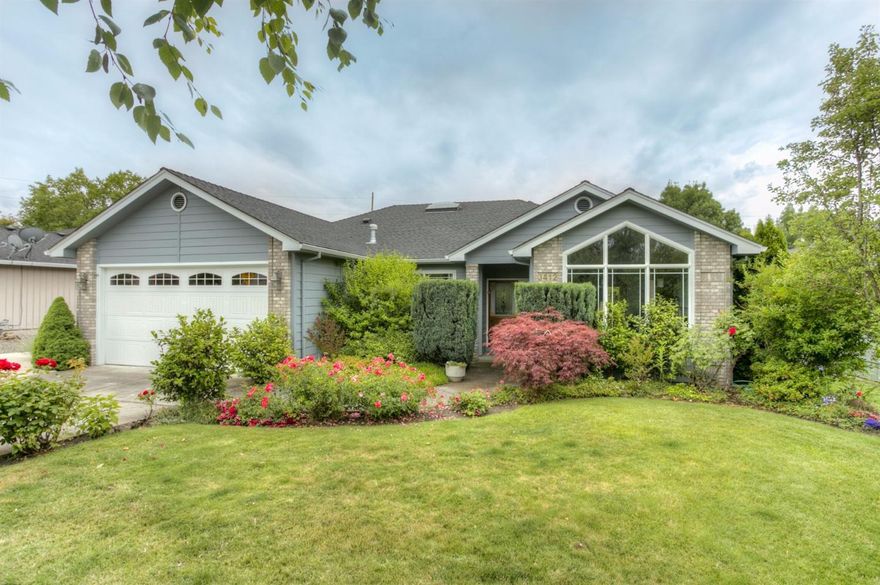 Absolutely gorgeous single level home in a fantastic E Medford location; this home is turn-key, move-in ready! Located in the Lone Pine School District just a block from the McAndrews walking path and backing to green space owned by the city, this wonderful neighborhood is quiet and convenient. The curb appeal is top notch with meticulous landscaping and beautiful plantings. The home is light and bright with fresh interior paint, new carpet throughout and abundant windows allowing for tons of natural light! You'll enjoy the tasteful floor plan with separate living and family rooms, one with a vaulted ceiling, grand window and gas fireplace, the other as a great room layout off the kitchen. The kitchen is open and functional with bar seating and breakfast nook, both overlooking the backyard. Hardwoods in the entry and kitchen combined with extensive tile flooring ensure years of easy care. The great room opens to a spacious covered deck, perched above the backyard taking in the southern