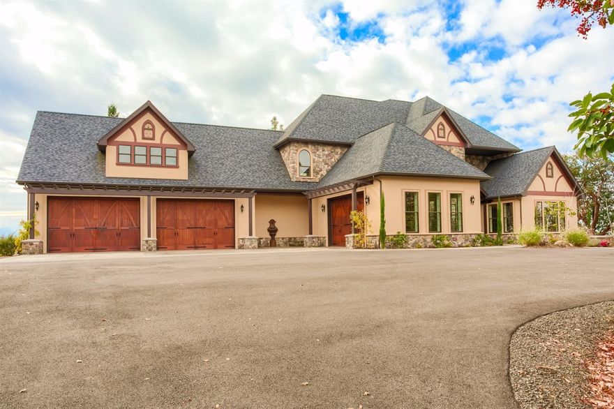Absolutely IMMACULATE - Brand New Construction! This 10,000+ square foot home sits at the top of a private hilltop and incredible 360-degree views define this Chalet. Built with true attention to detail this home features everything one can think of ranging from 13 ICF walls for incredibly efficient AC and heating systems to the gourmet Chef's dream kitchen and large home office! This home also presents to you a luxurious master suite featuring endless views of the Rogue Valley, a warm and inviting fireplace, tiled shower, vanity, jetted tub and a massive walk-in closet! Upstairs has its own living area, luxurious suite with a full bathroom walk-in closet and another huge room with multiple possibilities that features a wet bar. Downstairs includes a Sauna, wine cellar, and a full bar. Complete with six-car garage and a water feature as the finishing touch. This estate truly defines luxury. Don't miss the opportunity to own one of Southern Oregon's finest masterpieces.